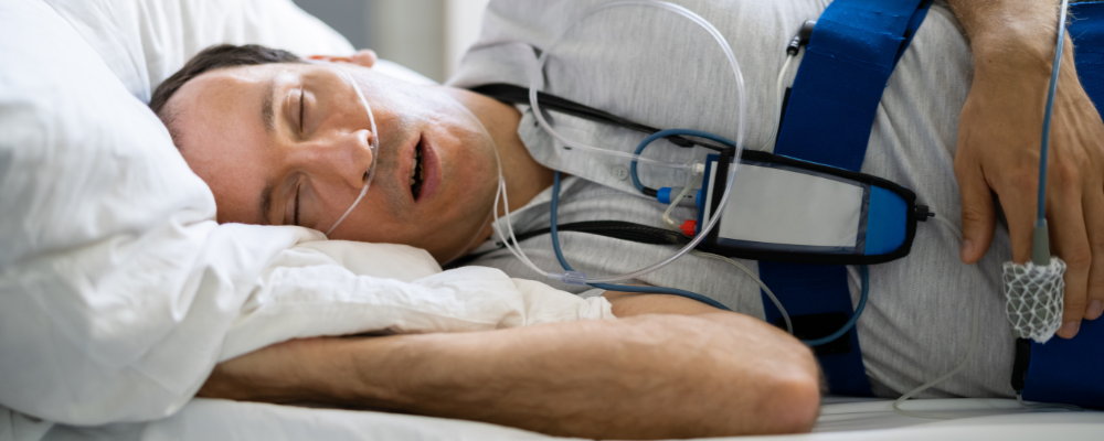 picture of man undergoing an at-home sleep study