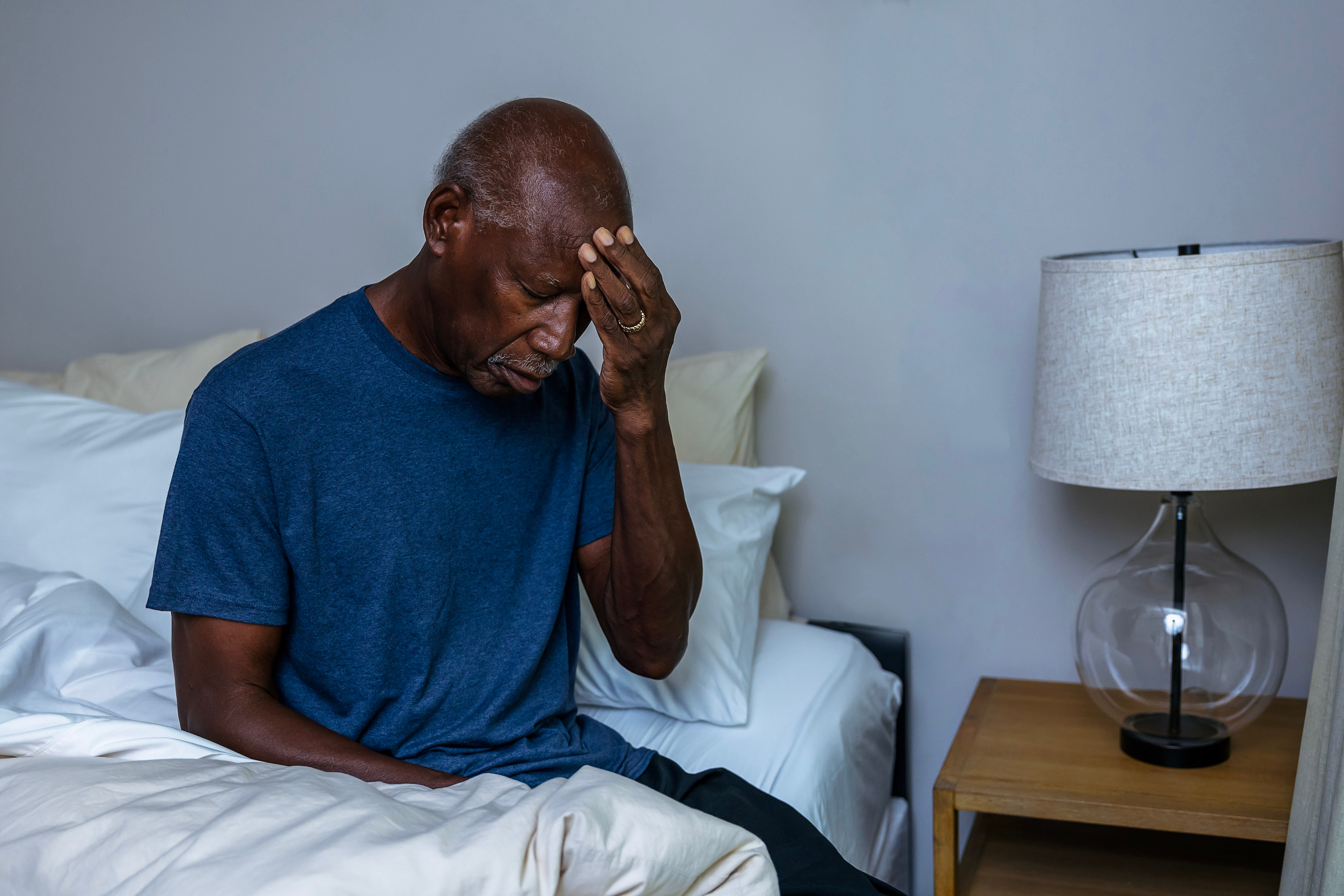 Man struggling with sleep at night Man struggling with sleep at night
