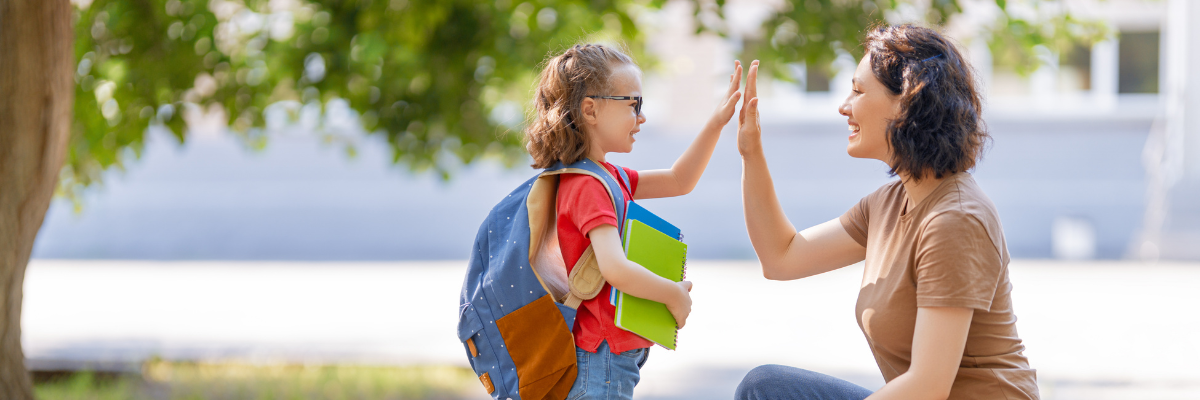 Mom and Daughter High Five