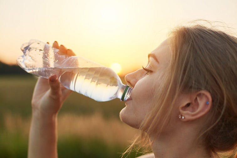 https://shop.aeroflowsleep.com/media/wysiwyg/woman-drinking-bottled-water.jpg